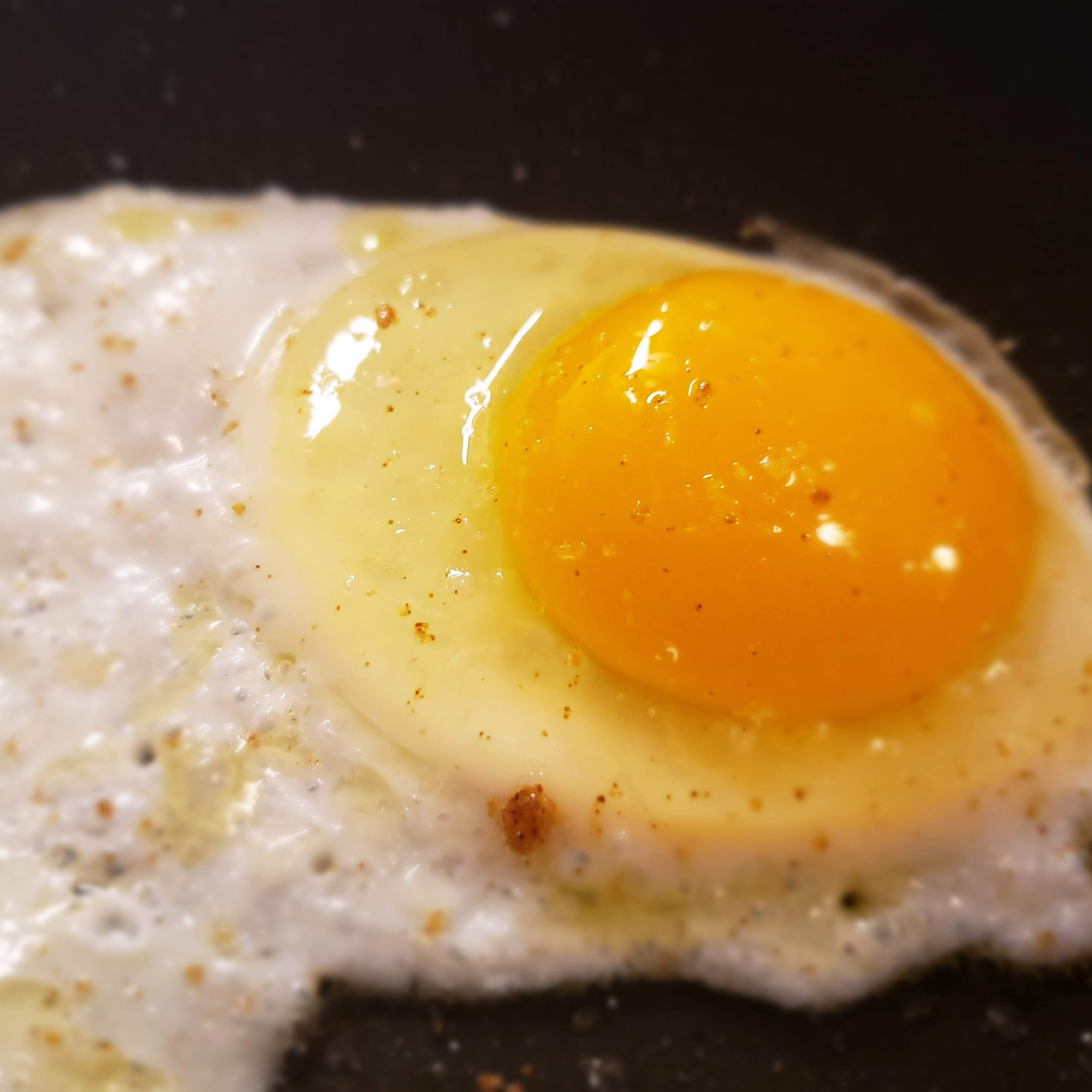 Egg frying in a skillet